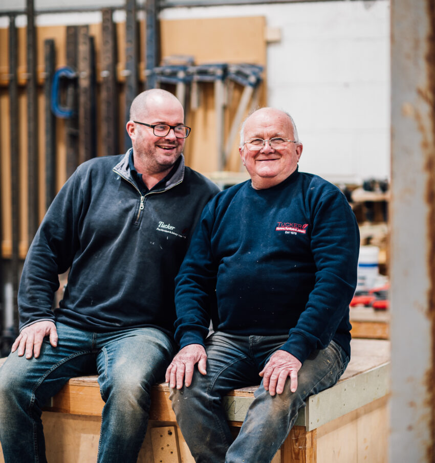 Dave and Lee Tucker, sitting together in the Tucker Joinery Workshop.