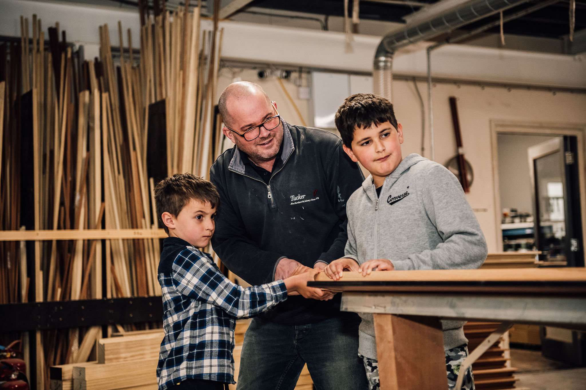Lee Tucker and his two sons, Archie and Ollie, work together in the Tucker Joinery Workshop.