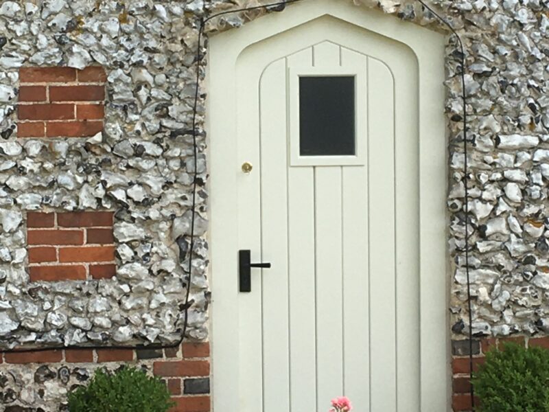 Arched white door